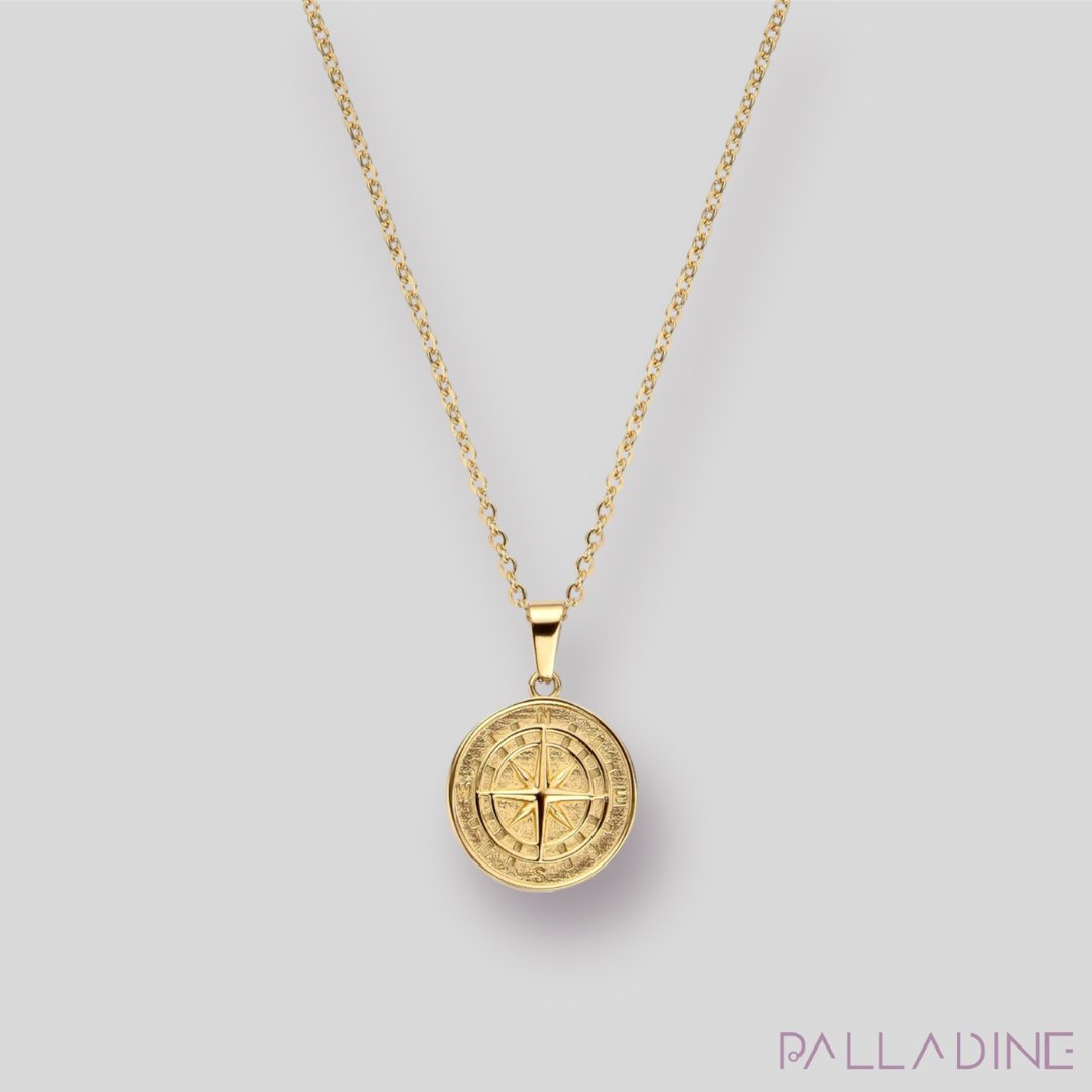 luxurious Compass Pendant. Crafted with stainless steel and 18k gold, hypoallergenic, long-lasting, and sophisticated.