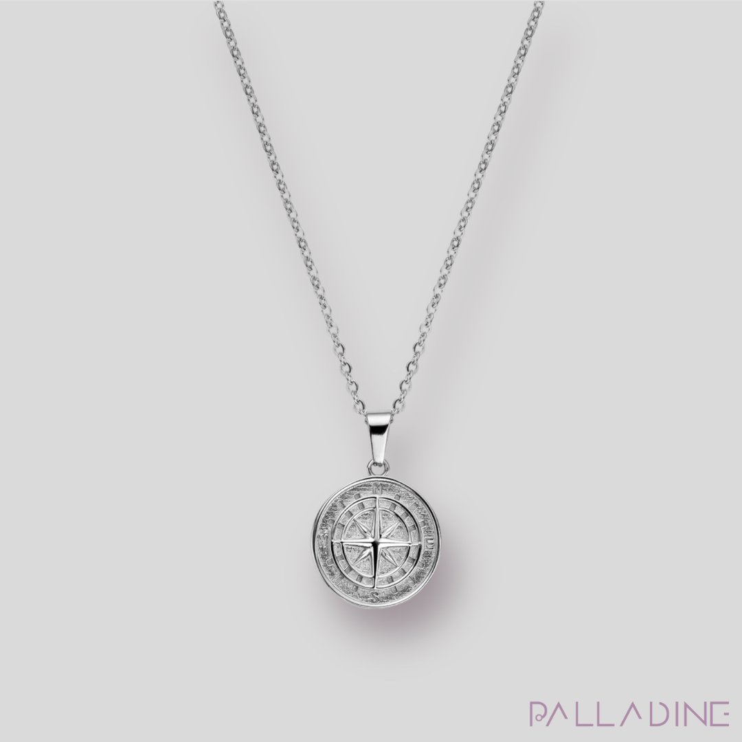 luxurious Compass Pendant. Crafted with stainless steel and rhodium, hypoallergenic, long-lasting, and water proof.