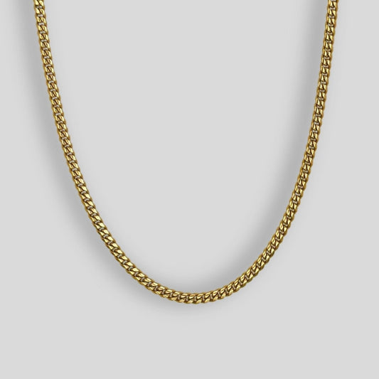 water-proof 5MM Cuban Link Chain created for everyday wear, crafted from durable stainless steel and refined 18k gold