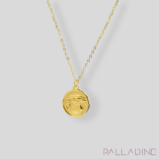 Gold Eye of Ra pendant with 18k gold-plated stainless steel, symbolizing power and protection, paired with an elegant chain