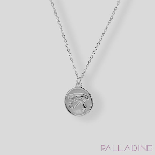 Silver Eye of Ra pendant with rhodium-plated stainless steel, symbolizing power and protection, paired with an elegant chain.