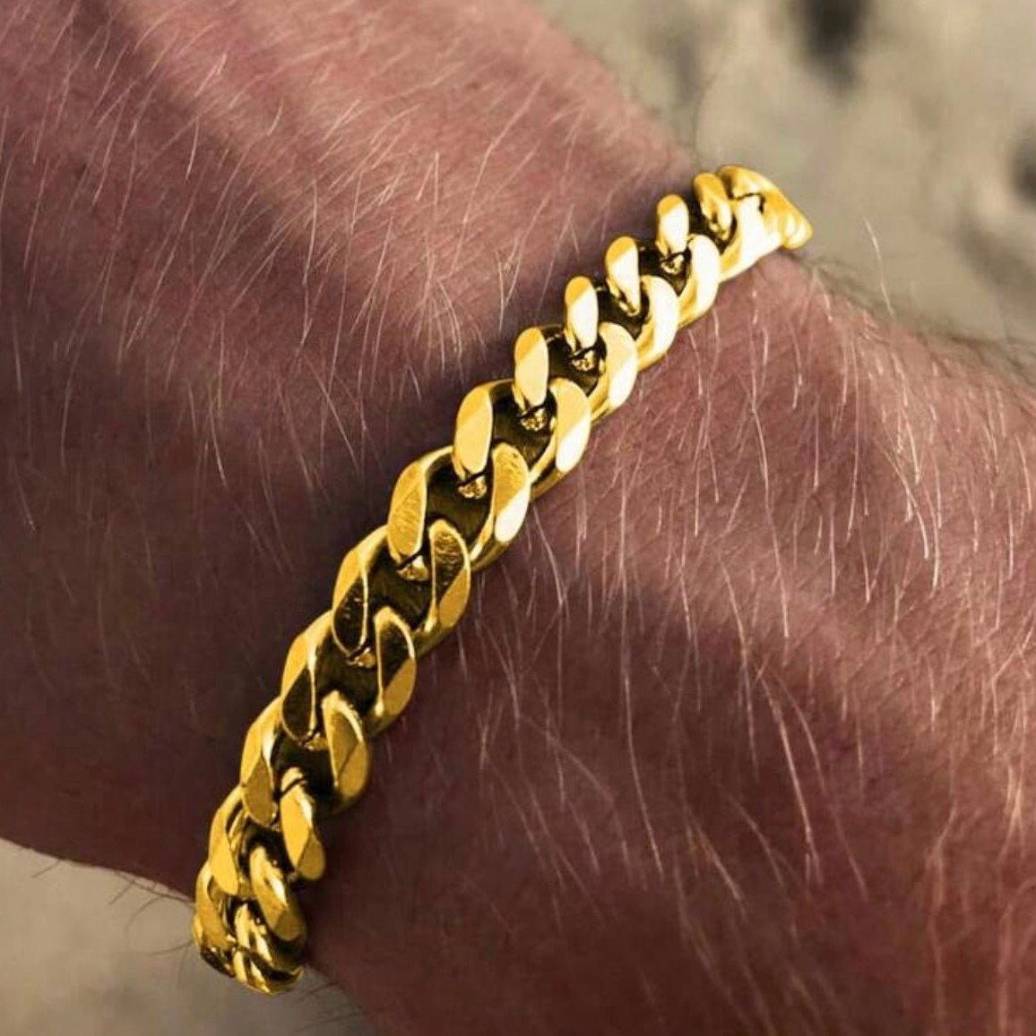 8mm Miami Cuban link bracelet, crafted in stainless steel and plated with 18K gold for a sleek, modern, and timeless look.