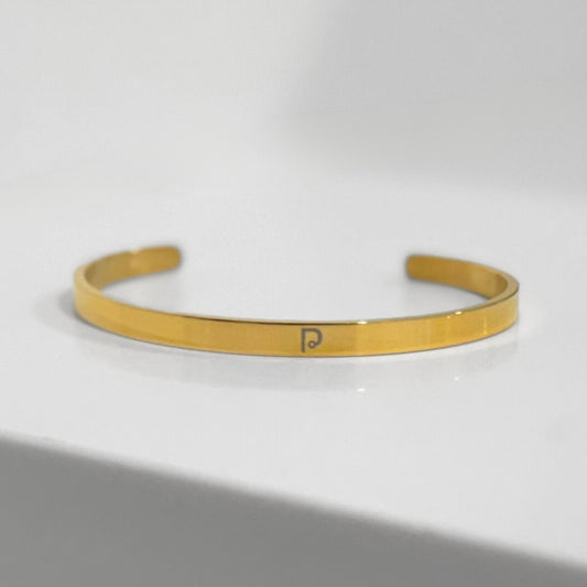 Gold open bangle bracelet, 5mm wide, crafted from durable stainless steel and plated with rhodium for a luxurious and adjustable fit