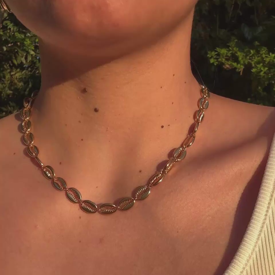 Cowrie shell necklace in gold water proof beach jewelry