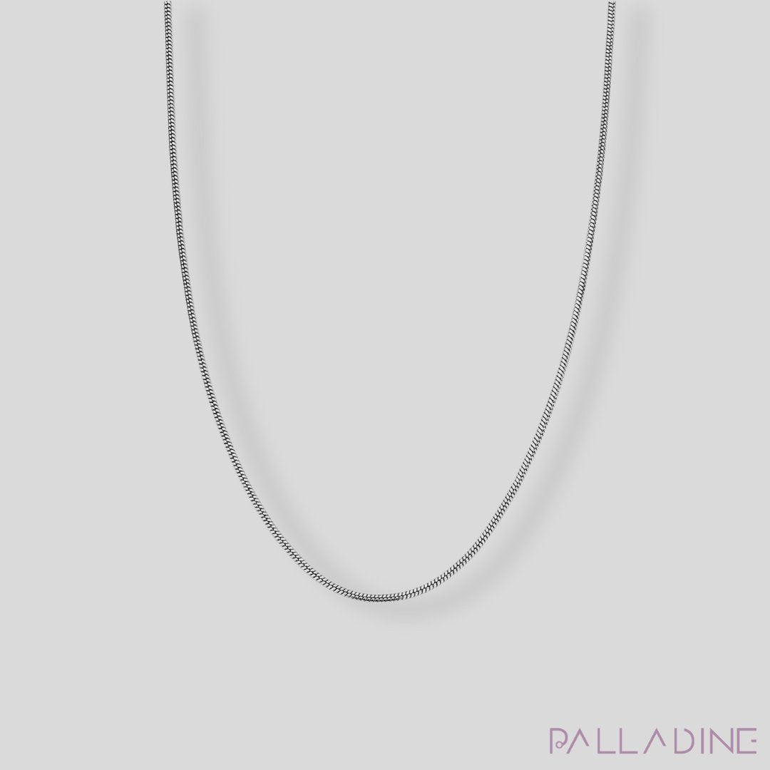 Stainless steel snake chain necklace, 2.4mm round chain plated in rhodium for a luxurious shine.