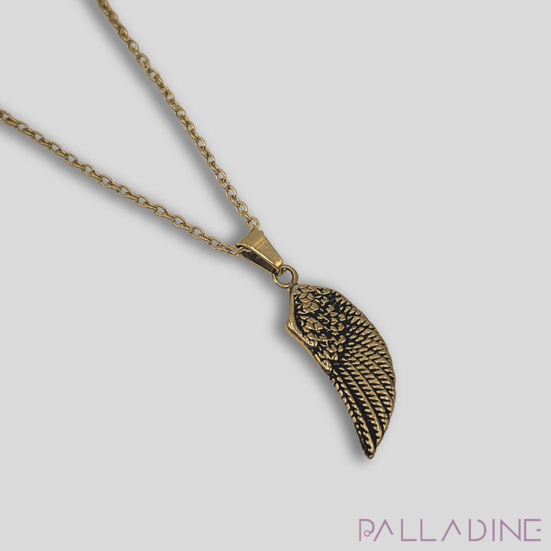 Stainless steel wing pendant plated with 18k gold, symbolizing resilience and freedom, paired with a durable 24-inch chain.